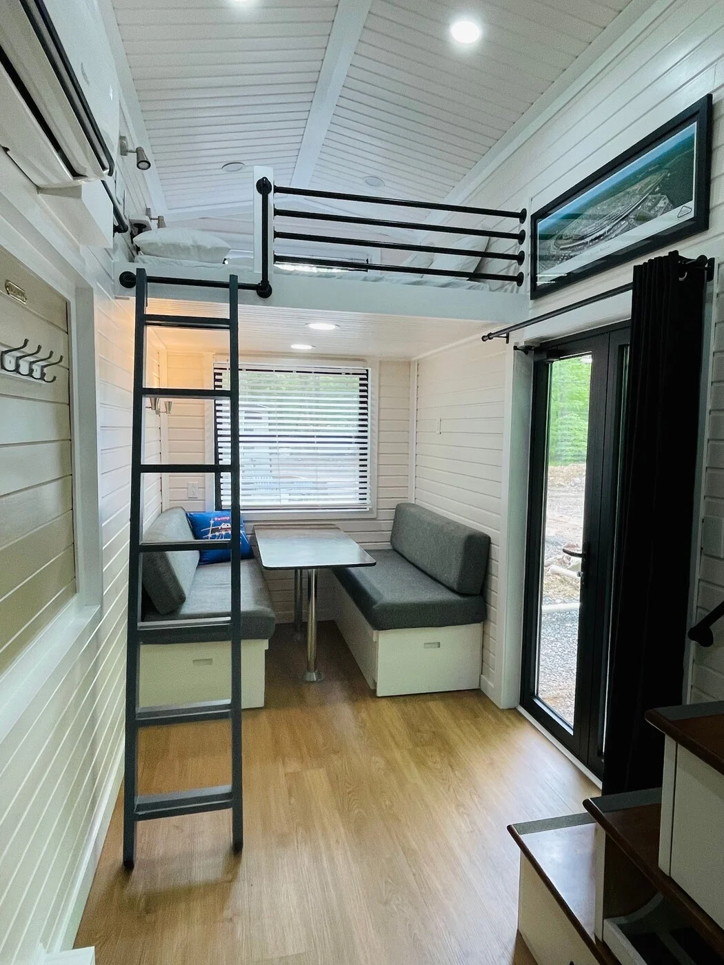 Speedway dining area and ladder access to the loft