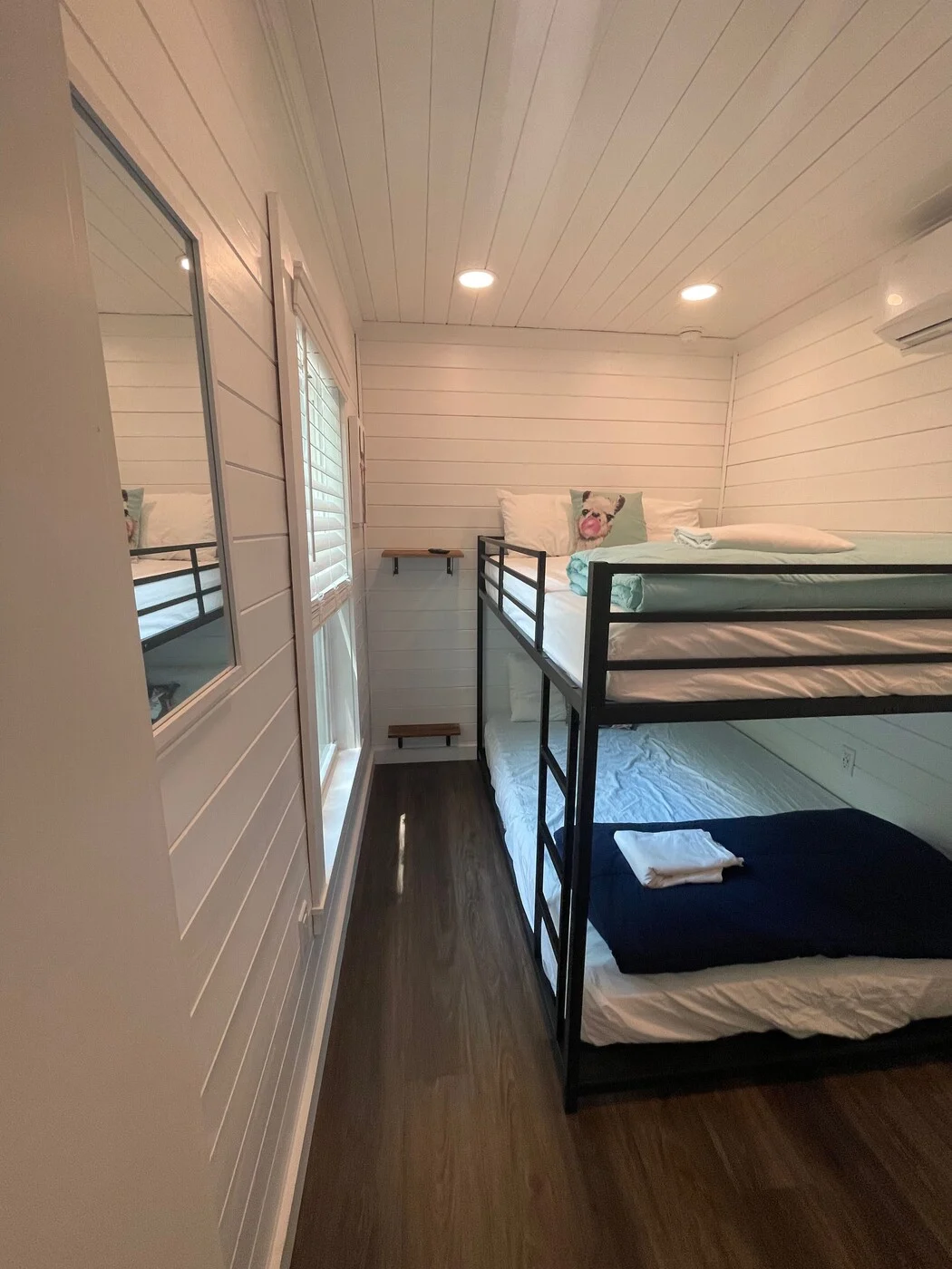Happy cabin second bedroom with full-size bunk beds