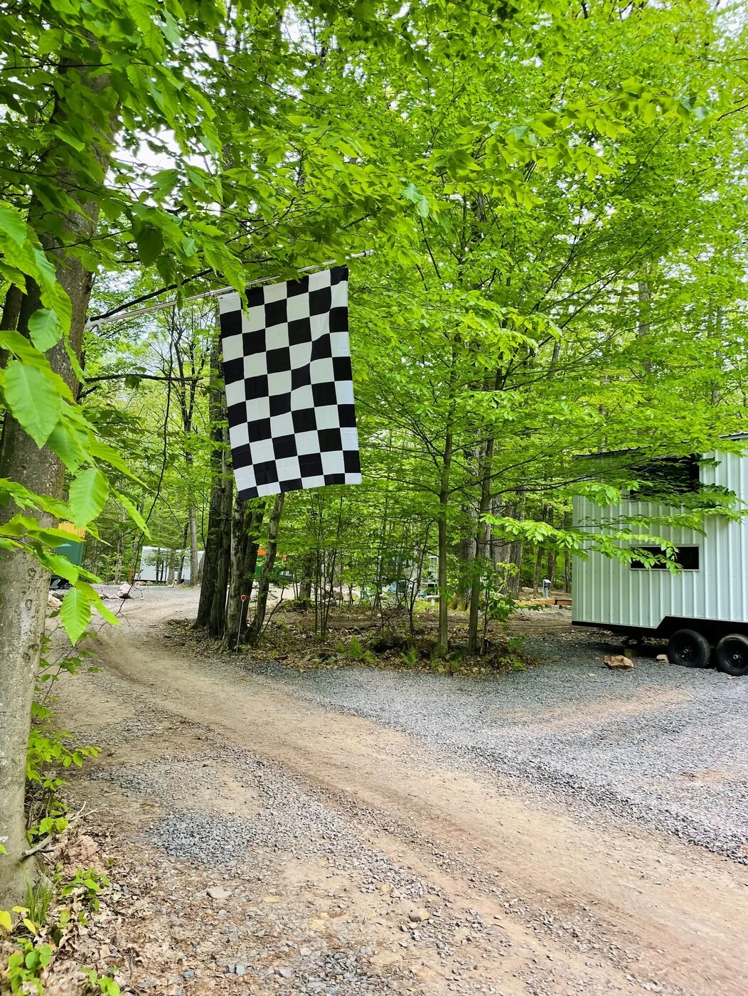 Speedway cabin entrance and checkered flag
