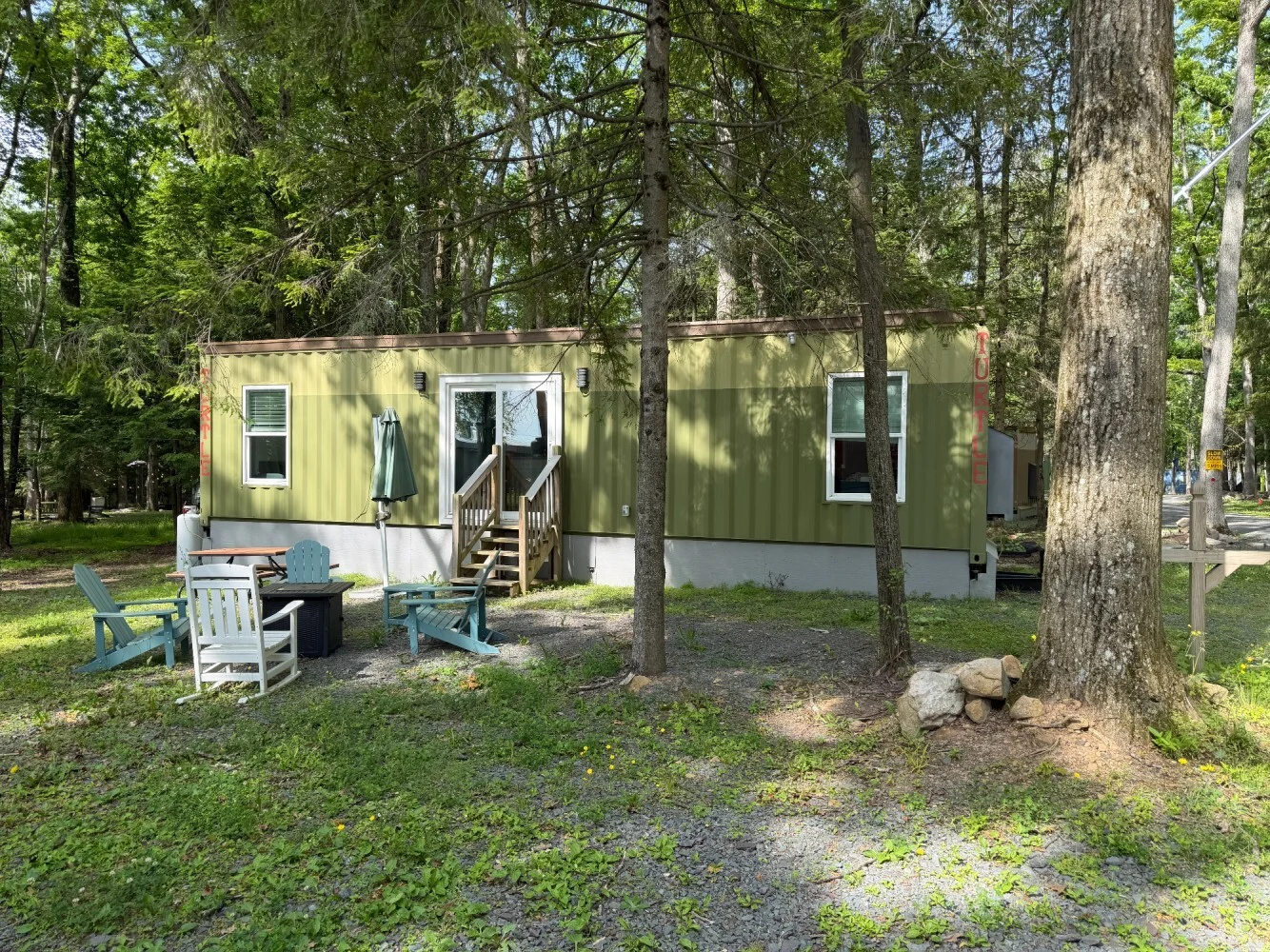 Turtle Xing cabin exterior with private outdoor seating