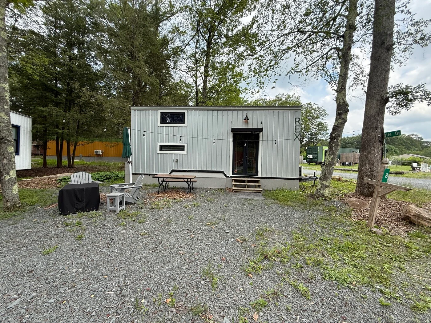 Rex loft cabin exterior with private outdoor seating
