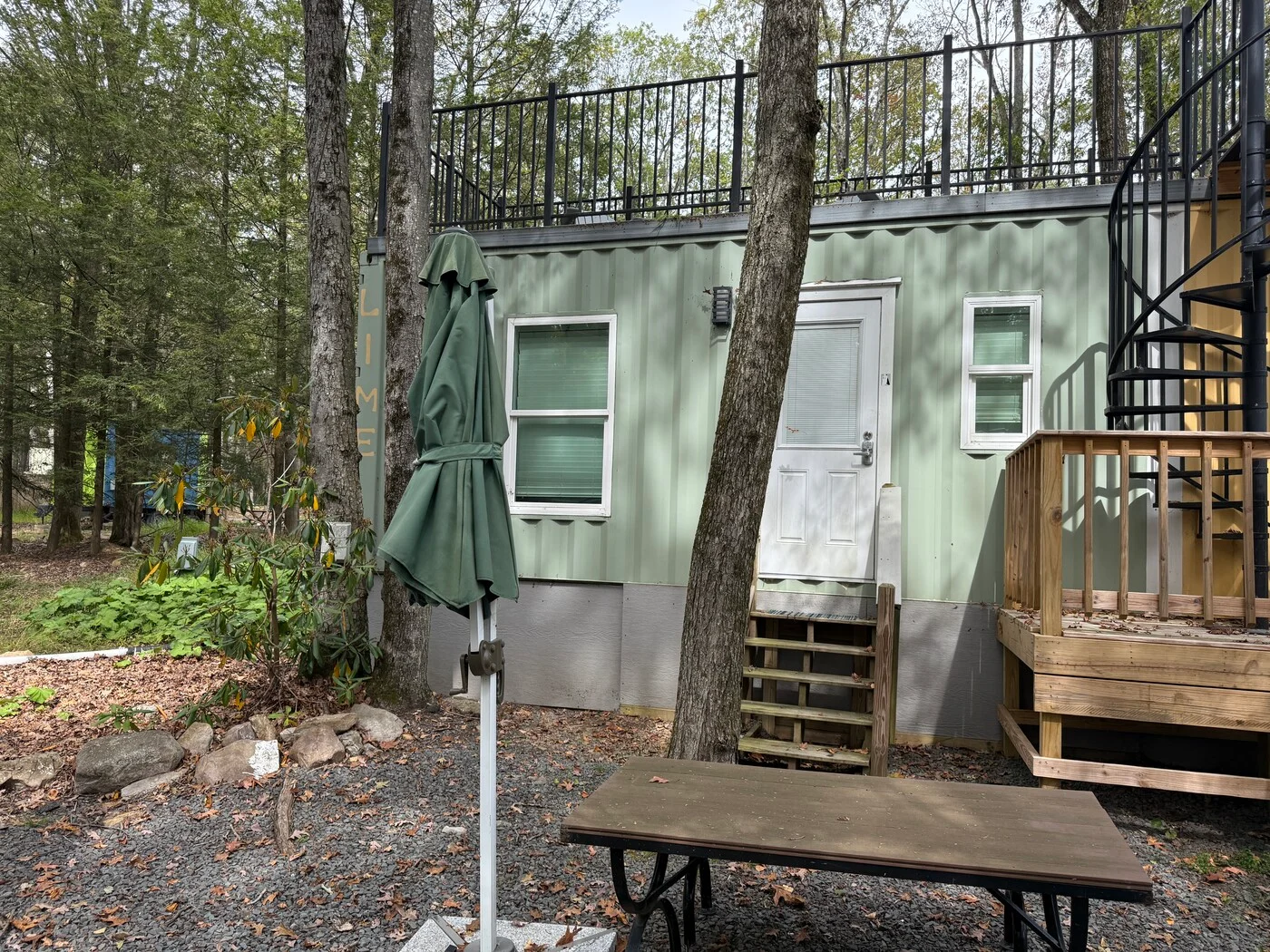 Lime studio exterior with steps to the shared rooftop deck